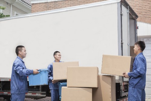 Person using a screen reader on a laptop for accessible removal company information