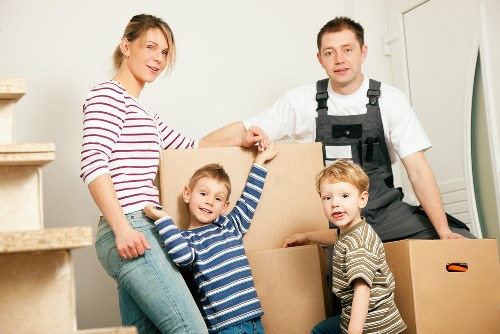 Team organising a Hackney office move with boxes and desks
