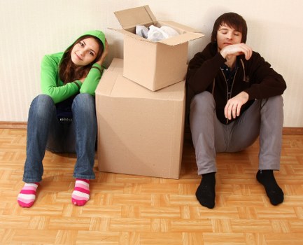 Removal workers in Hackney using PPE during furniture moving