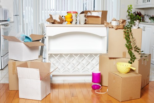 Packed boxes and furniture ready for storage in Hackney