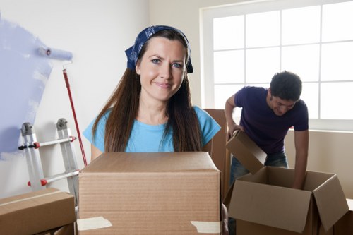 Local house removals team planning a move in a Hackney residential street