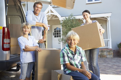 Careful loading of household items for a move in Hackney with stair access